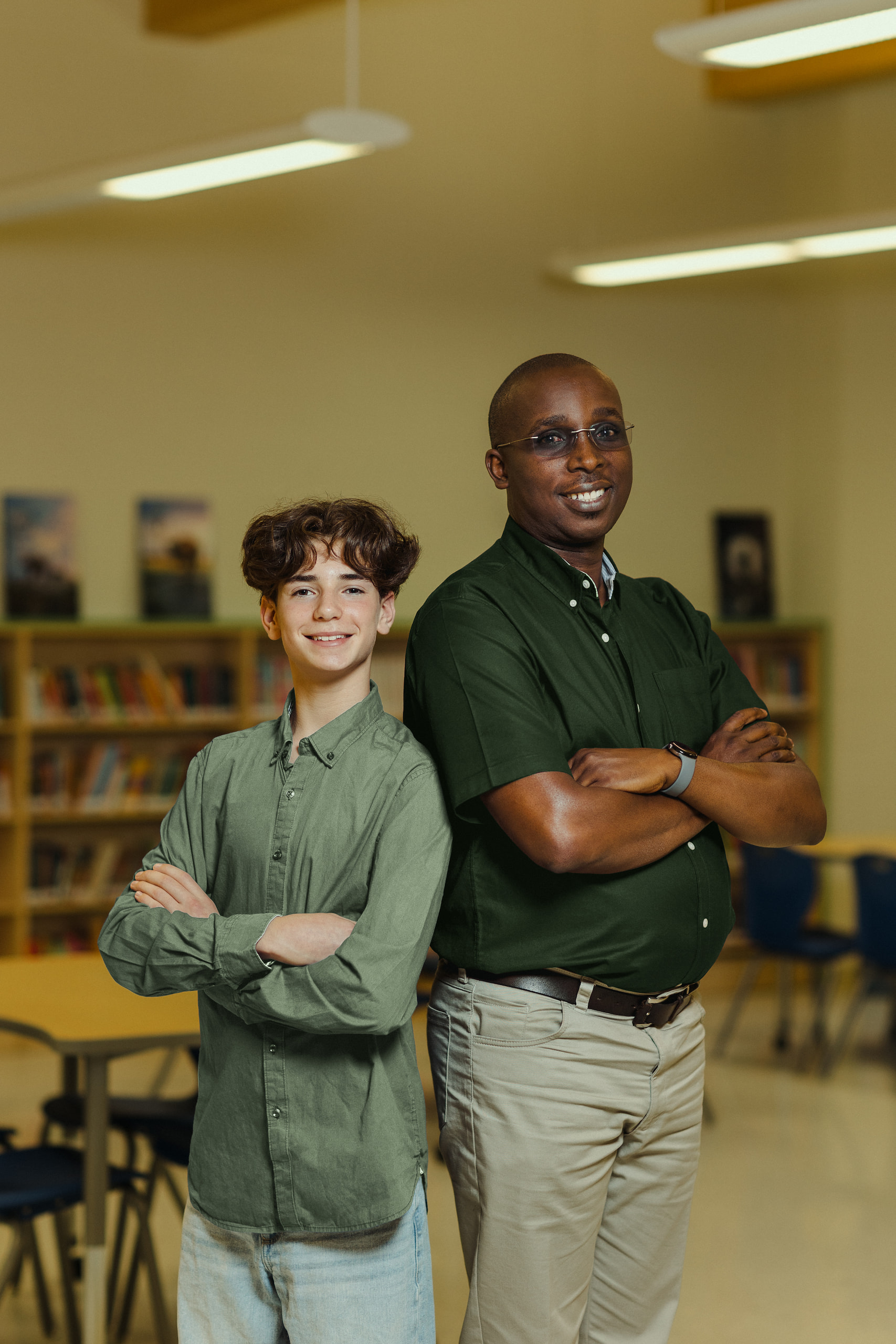 A photo of Monsieur Landry smiling with a student.